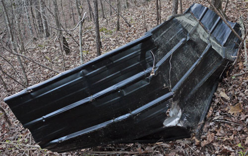 I removed this roof tin, perhaps deposited by a tornado, west of the North Dugger Mountain Shelter, 25 March 2020, with ECT hiker Pat Paton.